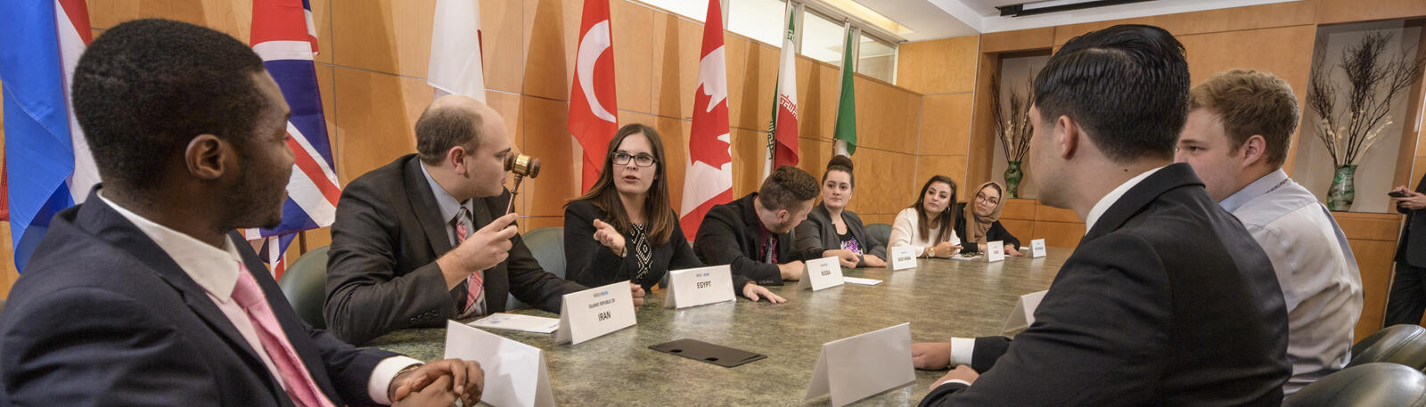 photo of model united nations students in a meeting